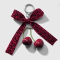 Chic keychain with red leopard print bow and red cherry charms on a silver metal ring - Red Leopard Velvet Ribbon Keychain