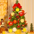 Mini lighted Christmas tree with red bows and pine cones in a gold woven basket - SYT307