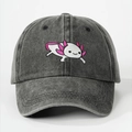 Close-up of pink axolotl embroidery on a dark grey washed cotton baseball cap texture - One Size / Black