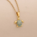 Detailed close-up of a golden sea turtle pendant necklace with green enamel shell finish - Blue Sea Turtle Necklace (5#Blue)