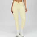 Leggings yoga a vita alta giallo pallido con design a vita incrociata a forma di V - M / Giallo crema