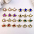 Set of 24 colorful crown heart-shaped nail rhinestones arranged on a textured surface - Gold-Mixed Style