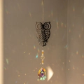 Hanging crystal suncatcher featuring a silver metal owl and teardrop prism for rainbows - Owl / 42cm