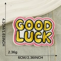 Self-adhesive Good Luck letter patch with pink embroidery border 6cm x 4.1cm - GOOD LUCK Black Yellow