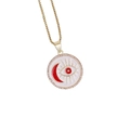 Macro detail of 18K gold necklace pendant with red enamel moon eye and zircon accents - Red