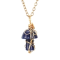 Detailed view of handmade gold wire wrapped dark blue mushroom pendant with chain - Blue Sodalite