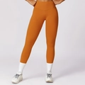 Leggings da yoga arancioni a vita alta a V, caratterizzati da un design professionale slim-fit - S / Arancione