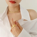 Flat gold blade snake chain necklace and layered textured ring on female model - Necklace / 30+8cm / Gold