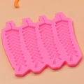 Pink silicone cake mold featuring four detailed wheat grain texture border patterns - 4-Cavity Firecracker Style