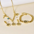 Hip hop style gold jewelry set with Evil Eye charms and sparkling pavé crystal accents - Three-Piece Set