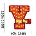 Letter Y embroidery patch with orange base and yellow dots showing 6.5cm height dimension - Letter Y