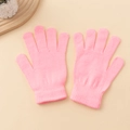 Close-up of pink knitted gloves featuring elastic ribbed cuffs and fine knit texture - One Size / Light Pink