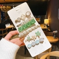 6-piece Korean style hair clip set with pearls and rhinestones on display card - Green Elf Hair Clip 6-Piece Set