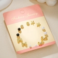 12-pair titanium steel earring set featuring gold bows, pearls and crystal accents - Gold Heart Letters (E1895-1)