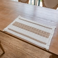 Boho woven table mat in cream and light brown stripes with chic fringed edges - Four Cotton Threads