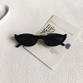 Retro black cat-eye sunglasses with glossy frame and dark lenses for a modern look - Black