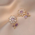 Elegant floral stud earrings with purple crystals on champagne silk background - Gold Purple Stud Earrings
