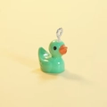 Glow-in-the-dark mint green resin duck pendant with a silver metal loop for DIY crafts - Solid Teal (Silver Pin)