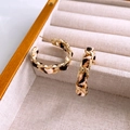 Detailed macro view of C-shaped hoop earrings with gold chain and leopard print fabric - 17# Leopard Print Leather Woven C-Shape Earrings (17#)