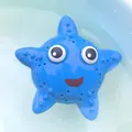 Blue starfish squeeze toy with cute cartoon face floating on water for bath time fun - Blue Bath Starfish Toy