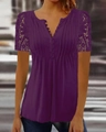 Detail view of purple V-neck top featuring delicate lace sleeves and button-up front - S / Tops / Purple