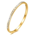 Brazalete ovalado dorado pulido de 4 mm con incrustaciones de circonita rectangular - Dorado