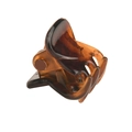 Close-up of small amber tortoiseshell claw hair clip with metal spring on white background - Dark Brown