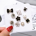 Set of 10 gold pins with black and white enamel clover and pearl designs on card - Black And White Flower Style