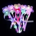 Macro view of five LED glowing heart fairy wands with colorful beads and silk ribbons - Starry Sky Magic Wand (Heart Shape)