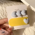 Y2K dopamine style hair clips set featuring blue heart designs on a yellow base - Blue Heart Clips Pair