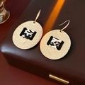 Golden hammer-textured round earrings with black and white leopard print fabric inlay - 52# Leopard Hollow Hoop (52# Hook-Gold-Brown-Oval)