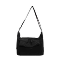 Detail of minimalist black nylon tote bag showing double zippers and front flap pocket - Black