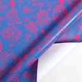 Navy blue birthday gift wrapping paper with red cake patterns and grid lines on reverse - Fluorescent Pink Cake