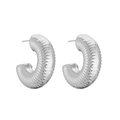 Macro shot of silver C-shaped chunky earrings featuring a detailed ribbed texture finish - Large 30mm / White Gold