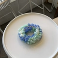 Lace scrunchie with blue and green pleated texture displayed on a white minimal tray - Blue and Green