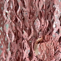 Close-up of pink wavy fringe curtain with shiny silver star pattern for party backdrop - Ceramic-Look S-Shape (PVC Decoration) / Pink