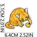 Detailed view of yellow cat embroidery patch with size dimensions 6.4x5.1cm for clothing - No.2 Cat Playing with Ball