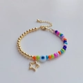 Böhmisches 18K vergoldetes Perlenarmband mit buntem Evil Eye und Sternanhänger - Bunt