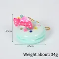 Porte-clés donut macaron vert menthe avec crème rose et chaîne à billes dorée - Décoration beignet nœud (avec chaîne à billes dorée) / 4.50cm / Vert Clair