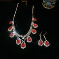 Sparkling starburst lighting on gold necklace and red teardrop earrings set - Necklace-Gold-Red