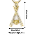 Detailed view of a gold baseball pendant with sparkling rhinestones and size measurements - Baseball and Bat