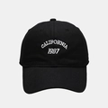 Detail of white CALIFORNIA 1987 embroidery on a black cotton baseball cap surface - Adjustable / Black