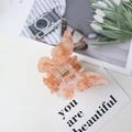Elegant butterfly acetate hair claw clip in orange pink marble finish with gold spring - Iridescent Orange