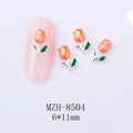 Macro view of 6x11mm alloy tulip nail charms with orange petals and green leaves - Orange Red Tulip Silver Base (8504)