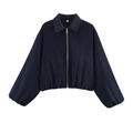 Detail of navy blue cropped jacket with silver zipper and classic collar design - Navy Blue