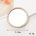 Dettaglio di uno specchio da trucco dorato da 5,3 cm con strass bianchi per custodie fai-da-te - Rotondo Oro (5.3cm)