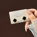 Detail of square black enamel earrings with gold crystal frame and S925 silver pins - Black Gold Square Rhinestone