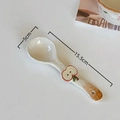 Cute cream-white ceramic spoon featuring a 3D red apple relief and a hanging hole - Sweetie-Long Handle Spoon