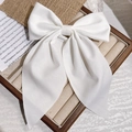 Elegant large white bow hair clip with long ribbons on minimalist display - White Long Ribbon