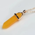 Macro detail of hexagonal yellow crystal pendant with golden link chain on white surface - Topaz / Pendant Only (Without Chain)